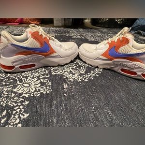 Blue and red Nike air max